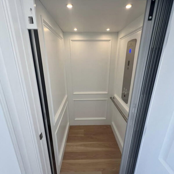 Crown Elevator installation in Avalon NJ panel cab and standard brushed stainless fixtures