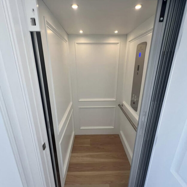 Crown Elevator installation in Avalon NJ panel cab and standard brushed stainless fixtures