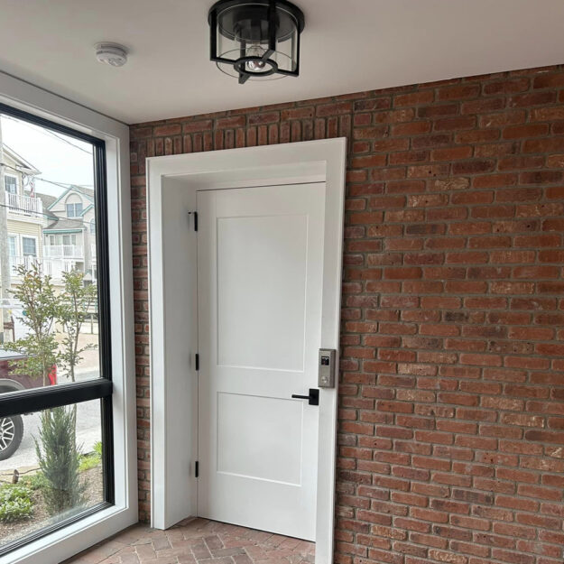 Crown Elevator New Jersey home elevator with 2 panel door