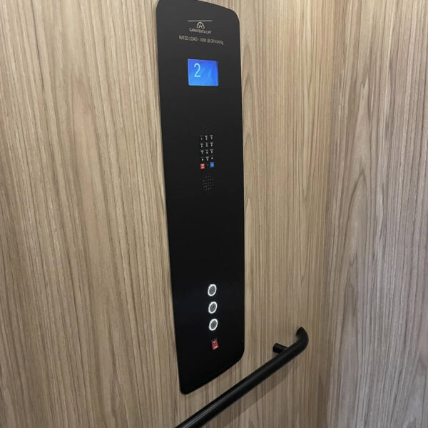 Crown Elevator Long Beach Island installation featuring Garaventa black control panel and handrails