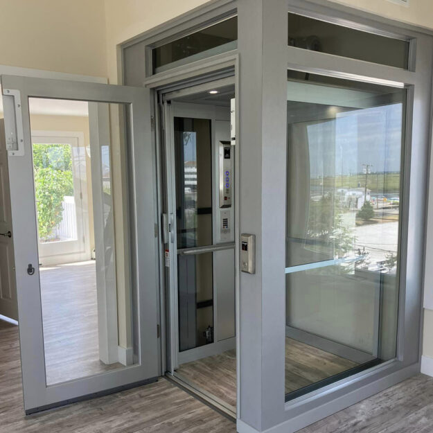 Crown Elevator New Jersey interior home elevator with glass accents