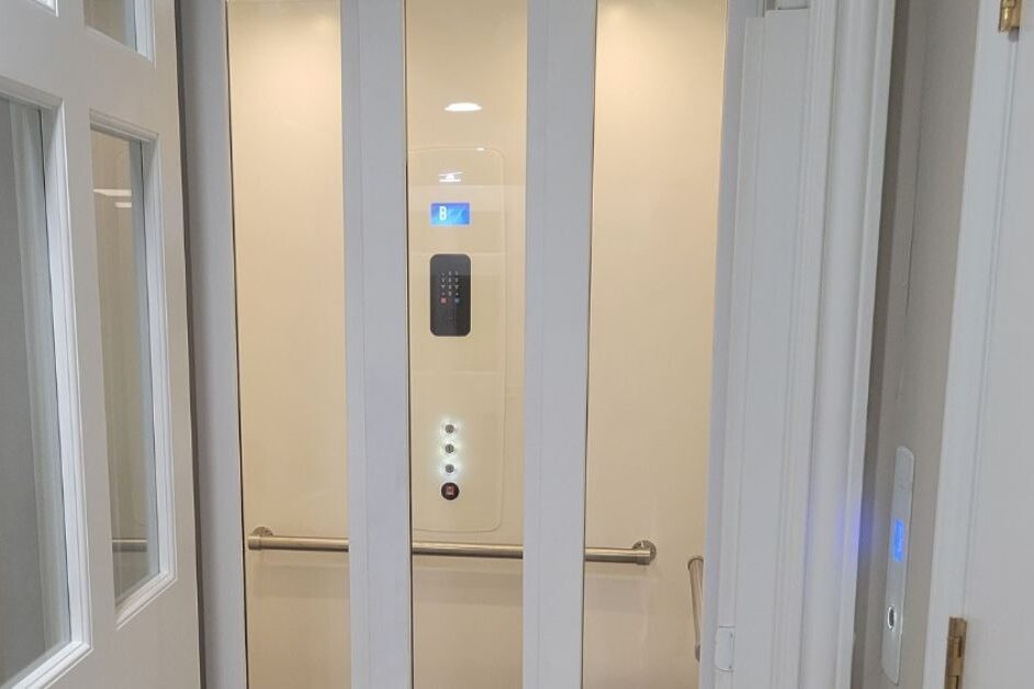 Garaventa Lift with 3 speed glass sliding doors in Ohio home handel and son elevator and lift co